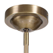 Uttermost Mimas 1-light globe pendant in gold hanging from ceiling, modern pendant lighting with spherical glass shade.