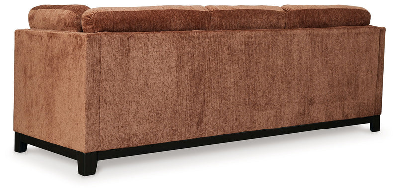 Ashley® Laylabrook plush upholstered sofa in bold spice color with dark wood trim, featuring a stationary design for living room comfort.