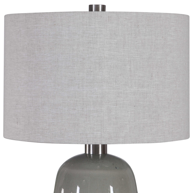 Light brown ceramic table lamp by Uttermost featuring a classic design, perfect for adding warmth to living spaces.