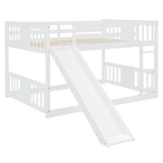White DreamHaus full over full bunk bed with ladder and slide, showcasing the sturdy frame, safety rails, and playful slide feature.