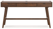 Signature Design by Ashley Lyncott home office desk with spacious surface and modern wood finish for writing and work tasks.