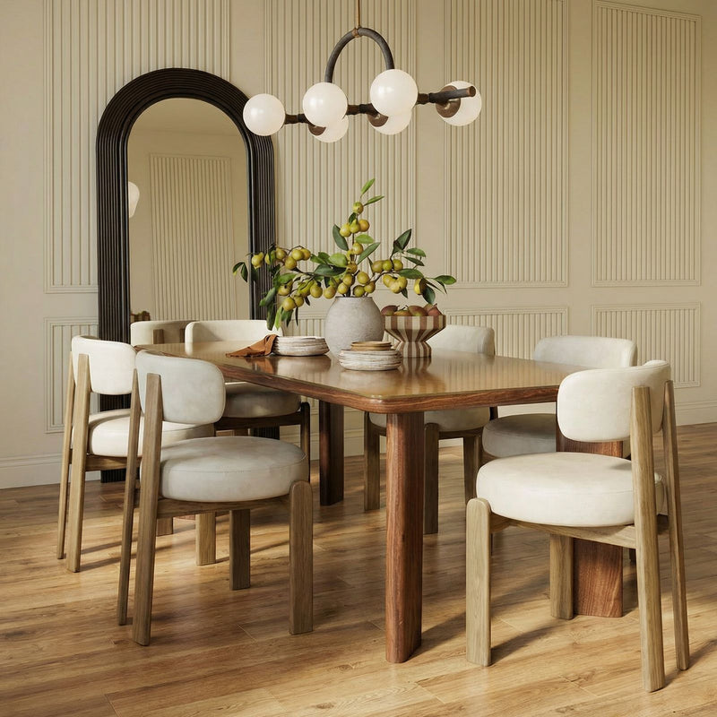 TOV Furniture Odessa dining side chair with sleek design, wooden legs, and upholstered seat in a modern style.