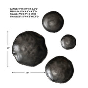 Set of four Uttermost Lucky Coins wall decor bowls with intricate metallic designs, mounted on a neutral background.