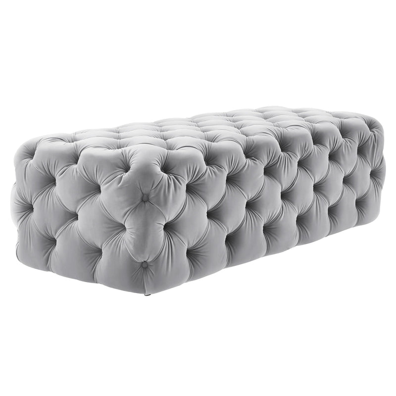 TOV Furniture Kaylee velvet ottoman with plush upholstered surface and modern design, placed in a stylish living room setting.