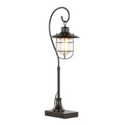 Landen contemporary task lamp set by Lumi Source with oil rubbed bronze finish and clear glass shades on a desk.