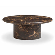 Dark brown TOV Furniture Byron round coffee table with sleek wooden surface and modern design.