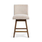 Classic Home Ava swivel counter stool in vanilla oat with a modern design and wooden legs, 24-27 inches height.