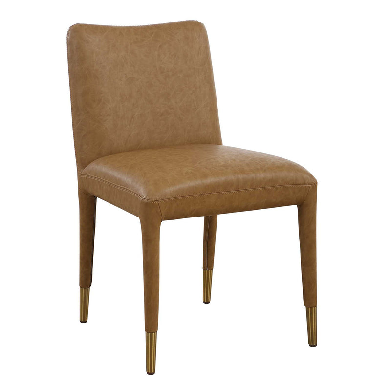 Pair of Uttermost Conifer dining chairs with wooden legs and upholstered seats, showcasing elegant, modern design.