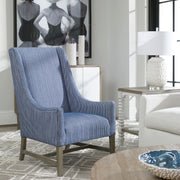 Blue Galiot Wingback Accent Chair by Uttermost featuring a plush upholstered seat and high backrest for elegant comfort.