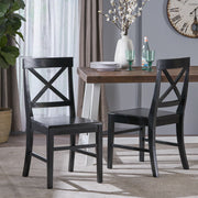 Set of two Noble House Plethora dining chairs with X-shaped backrests, showcasing sleek wooden frames and cushioned seats.