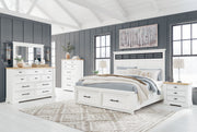 Ashbryn 6-piece bedroom set by Benchcraft® featuring panel storage beds and coordinating bedroom furniture in a modern design.