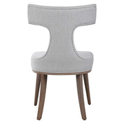 Pair of white Uttermost Klismos accent chairs with curved wooden legs and elegant design, set of two for stylish seating.