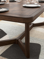 Rectangular dark brown dining room extension table by Signature Design Ashley, showcasing smooth surface and sturdy legs.