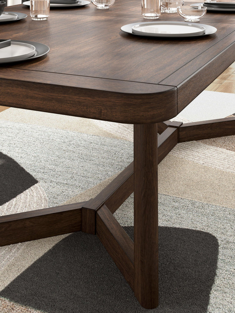 Rectangular dark brown dining room extension table by Signature Design Ashley, showcasing smooth surface and sturdy legs.