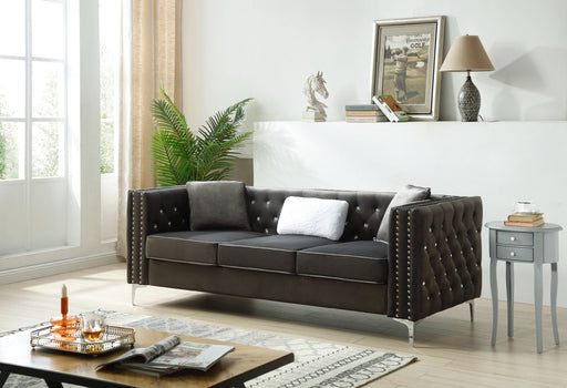 Glory Furniture Paige stationary sofa with plush cushions and modern design, in a cozy living room setting.