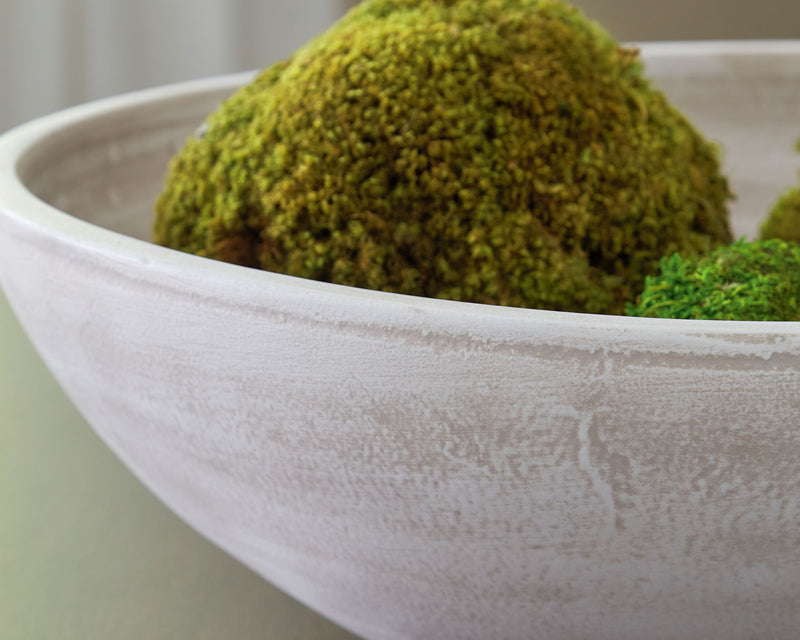 Signature Design by Ashley Meadie bowl from Plates & Bowls collection, featuring a sleek ceramic design with a smooth finish.