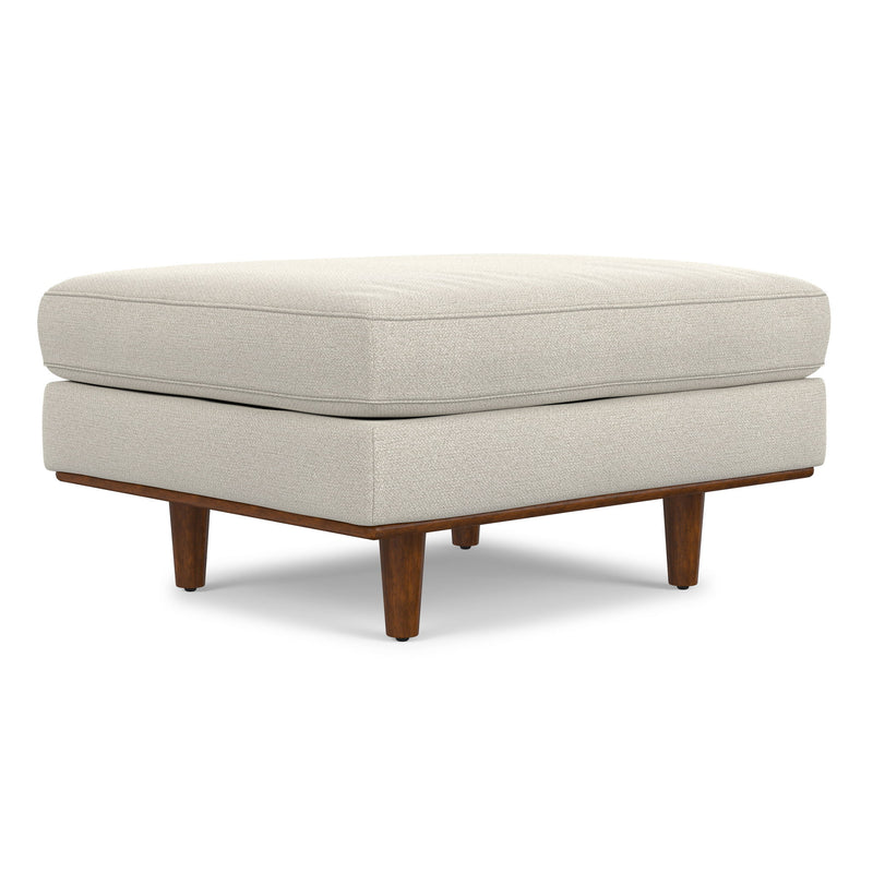Simpli-Home Morrison handcrafted upholstered ottoman with plush fabric and wooden legs, versatile and stylish for living room decor.
