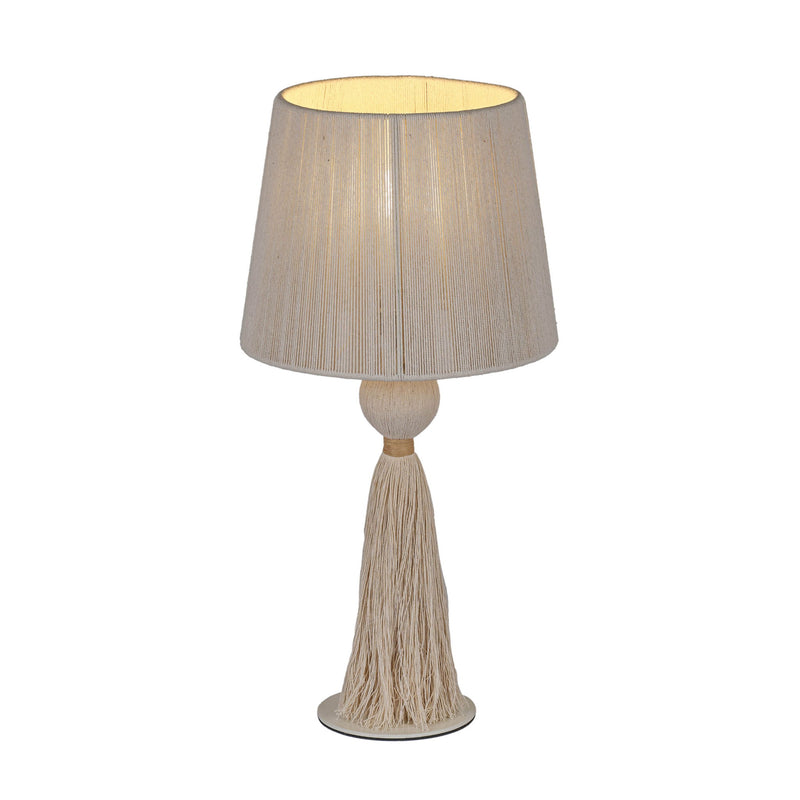 TOV Furniture Samba table lamp with a sleek modern design and a cylindrical shade, placed on a wooden surface.