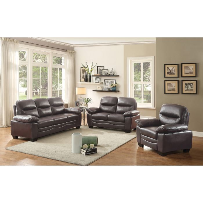 Glory Furniture Marta arm chair with plush upholstery and wooden legs, modern design, shown in a cozy living room setting.