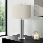 Contemporary 8th Street table lamp with a sleek design, featuring a cylindrical shade and modern base perfect for living spaces.