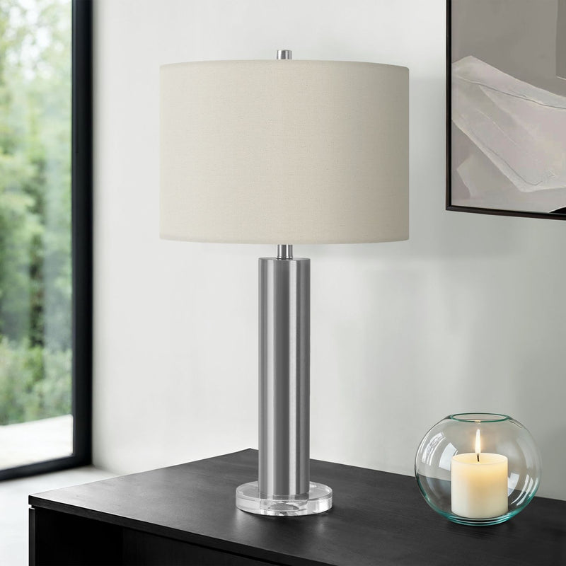 Contemporary 8th Street table lamp with a sleek design, featuring a cylindrical shade and modern base perfect for living spaces.
