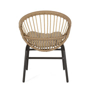Set of two Noble House outdoor accent chairs with curved backs and basket frames in light brown and beige.