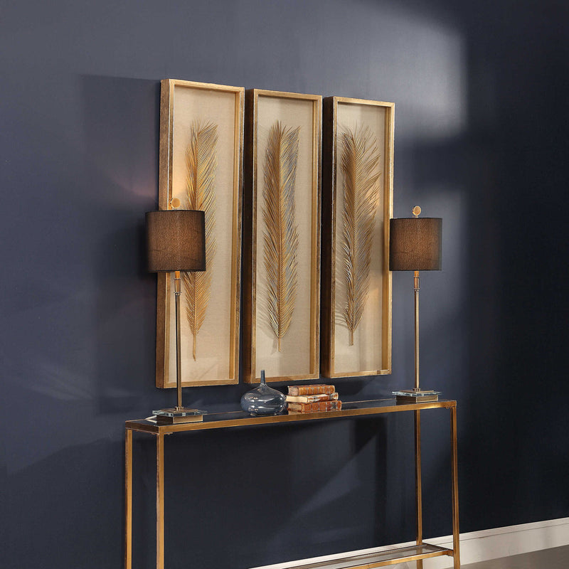 Set of three gold Palma leaf shadow box wall decor by Uttermost, featuring intricate leaf designs for modern interior decoration.