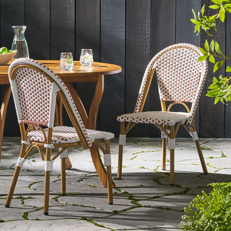 Outdoor rattan and aluminum French bistro chair set by Noble House, featuring woven rattan seats and sleek metal frames.
