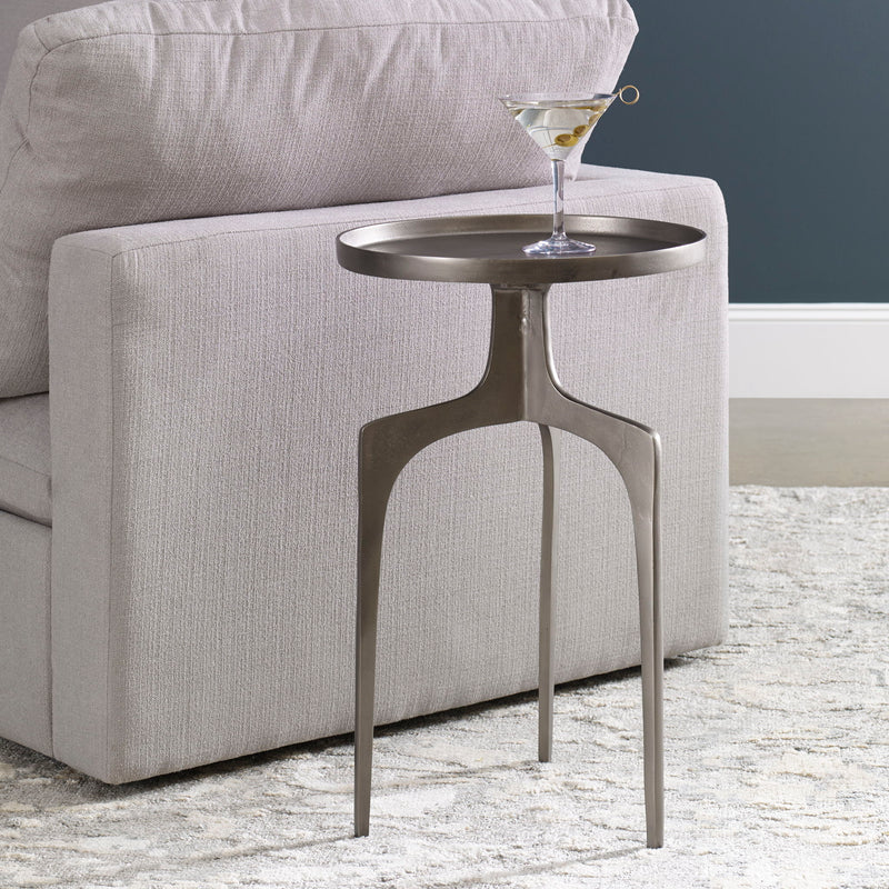 Uttermost Kenna accent table with a sleek, modern design featuring a round top and metal base, perfect for stylish living spaces.