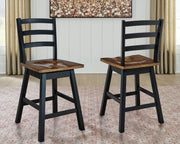Pair of Wildenauer swivel stools by Signature Design Ashley, featuring wooden seats and metal bases, set of two for modern dining.