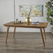 Outdoor teak dining table with sturdy frame, ideal for patio or garden outdoor dining spaces by Noble House.