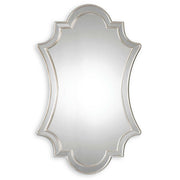 Elara wall mirror by Uttermost with antiqued silver finish, featuring a round frame and elegant reflective surface.