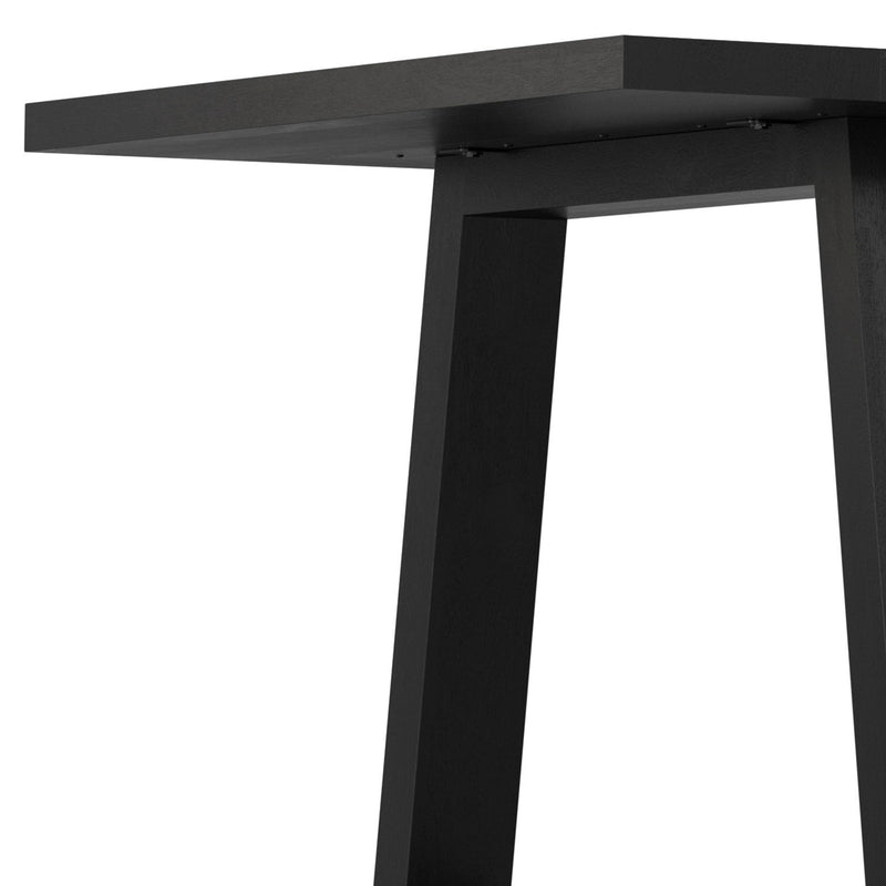 Simpli-Home Whitley dining table with wooden surface and sturdy legs, ideal for modern dining rooms.