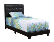 Upholstered Caldwell bed by Glory Furniture with padded headboard and neutral fabric, shown in a modern bedroom setting.