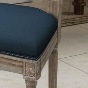 Noble House traditional style dining chair set with fabric upholstery, featuring elegant wooden frames and cushioned seats.
