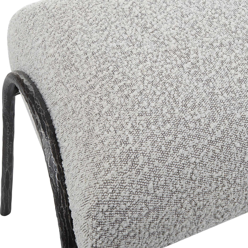 Gray upholstered Jacobsen Modern Bench by Uttermost featuring sleek design and plush fabric upholstery.