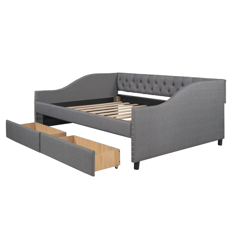 DreamHaus upholstered storage daybed with wood slat support and two drawers, showcasing a plush fabric finish and sturdy frame.