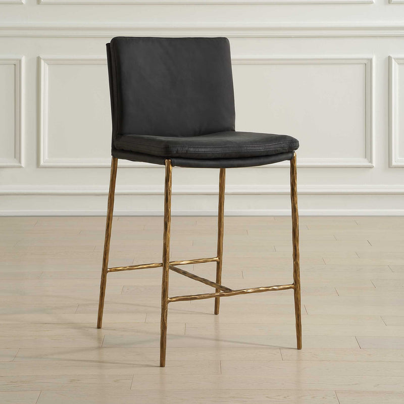 Uttermost Ascend counter stool with a sleek wooden seat and metal frame, 24-27 inch counter height, modern design.
