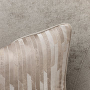 Michael Amini La Rachelle swivel chair with plush upholstery and a modern design, featuring a rounded back and chrome base.