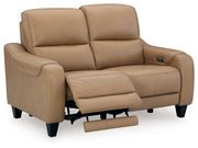 Ashley Mosswell power reclining loveseat with adjustable headrest in toffee, showcasing plush fabric and comfortable seating.