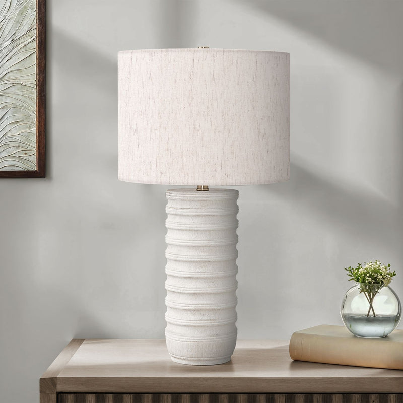 Cream resin transitional table lamp with a sleek, modern design and a sturdy base, ideal for contemporary home lighting.