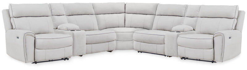 Signature Design by Ashley reclining sectional sofa with plush cushions and reclining features, showcasing a modern living room setup.
