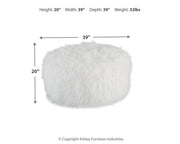 Large Signature Design by Ashley Galice oversized ottoman in neutral fabric, serving as a stylish accent piece.