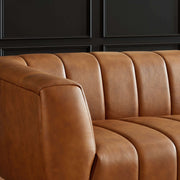 Ashcroft Furniture Ava stationary sofa with gold and tan upholstery, featuring a modern design and plush cushions.