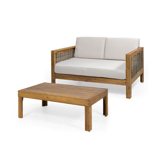 Noble House outdoor patio set with beige loveseat and coffee table, teak frame, two-piece outdoor furniture for patio or garden.