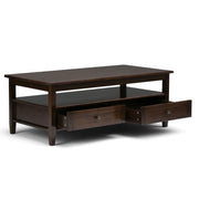 Handcrafted Warm Shaker coffee table by Simpli-Home featuring a smooth wooden surface and sturdy legs.