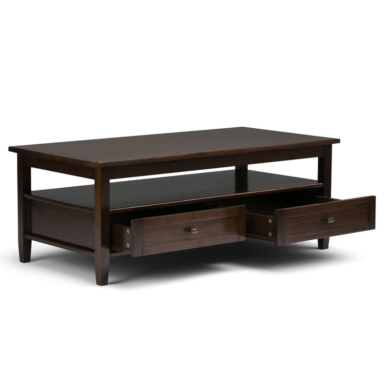 Handcrafted Warm Shaker coffee table by Simpli-Home featuring a smooth wooden surface and sturdy legs.