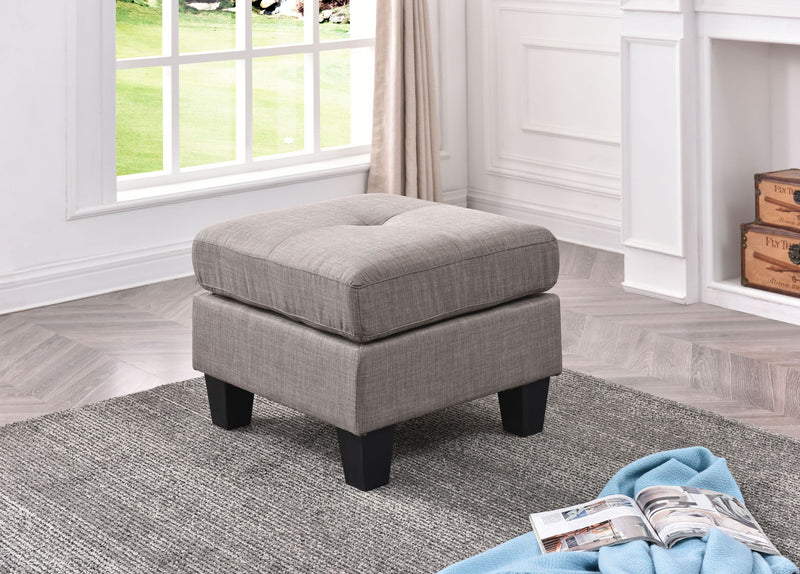 Upholstered casual ottoman by Glory Furniture with a stylish fabric cover, suitable for modern living room or lounge space.