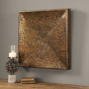 Uttermost Blaise wall art in antiqued bronze finish, featuring textured, decorative wall decor with elegant, artistic design.