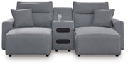 Signature Design by Ashley Modmax II reclining sectional in salt and pepper fabric, featuring plush cushions and reclining seats.